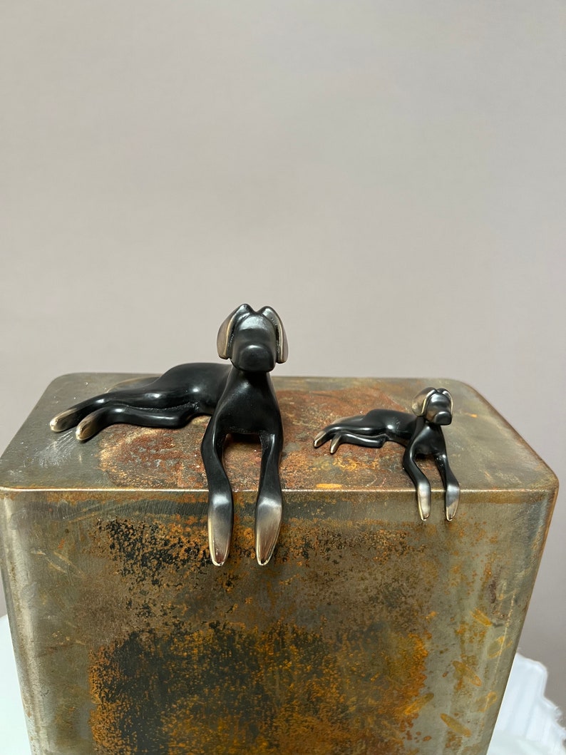 Black dog bronze sculpture. image 2