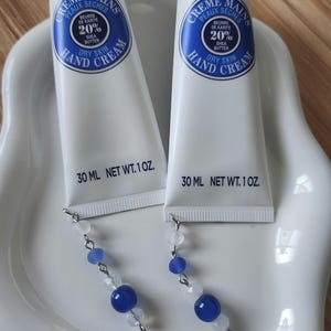 Breloques crème pour les mains/porte-clés crème pour les mains, cadeau parfait, L Occitane crème pour les mains au beurre de karité 1 oz