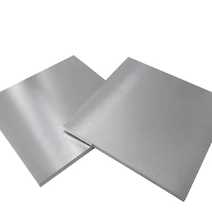 May include: Two square sheets of brushed silver metal.