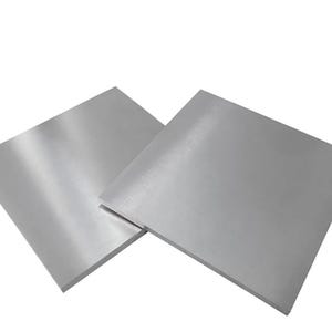 May include: Two square sheets of brushed silver metal.
