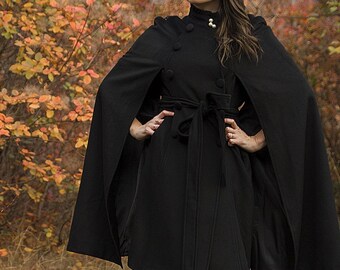 black capelet jacket