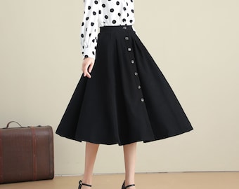 Jupe noire boutonnée sur le devant Midi, jupe plissée A Line avec poche, jupe circulaire taille haute, jupe swing d'inspiration vintage femme, Xiaolizi K3268