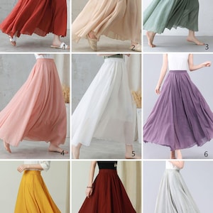 May include: Nine flowing, full-length skirts in various colors are displayed. The colors include red, beige, light green, pink, white, purple, yellow, dark red, and gray. The skirts appear to be made of a lightweight fabric, suitable for warm weather.