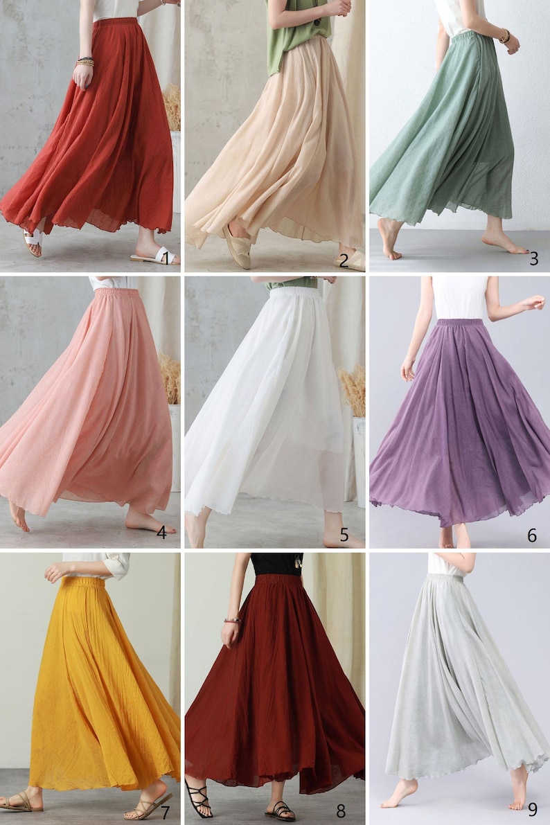 May include: Nine flowing, full-length skirts in various colors are displayed. The colors include red, beige, light green, pink, white, purple, yellow, dark red, and gray. The skirts appear to be made of a lightweight fabric, suitable for warm weather.
