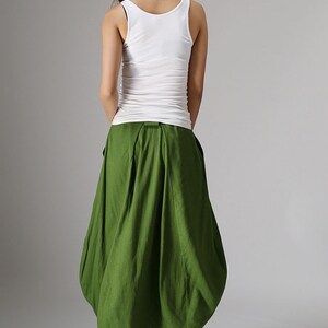 May include: A set of three ceramic mugs with a speckled, matte finish. The mugs are in shades of gray, white, and black. Each mug has a simple, modern design, suitable for coffee or tea.