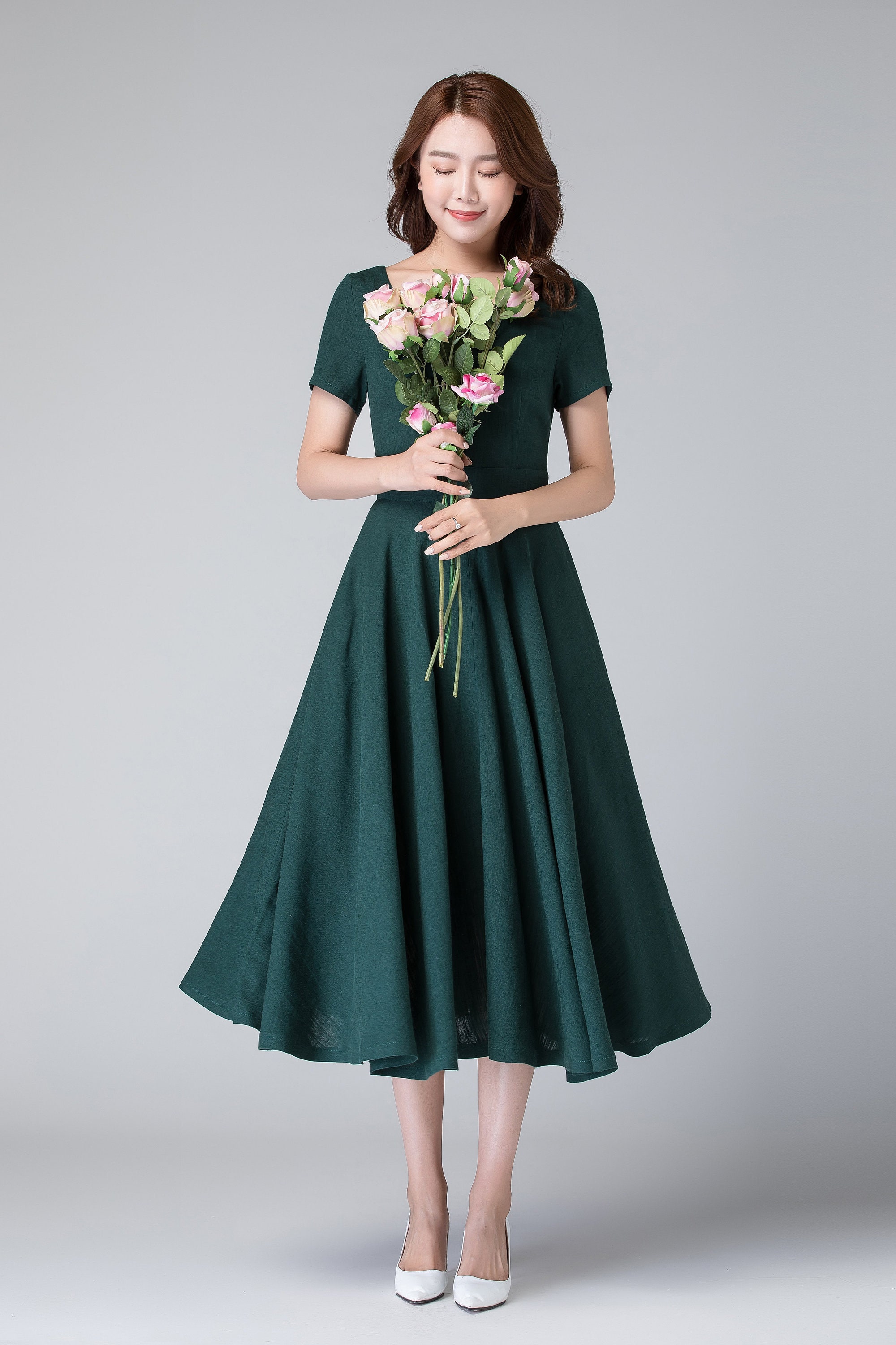 green dress with pockets