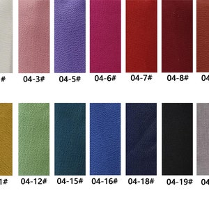 May include: Swatch card displaying 21 fabric samples in a range of colours, including white, pink, purple, red, brown, yellow, green, blue, black, and grey. The samples are labelled with numbers from 04-1 to 04-21.