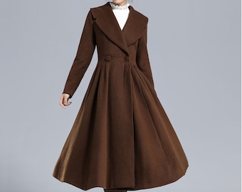 May include: A brown long-sleeved coat with a wide collar and a flared skirt. The coat has a double-breasted closure with two buttons.