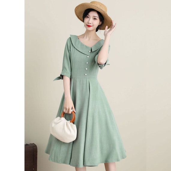 green emerald velvet dress Dalton Pleated Midi Dress in Light Sage