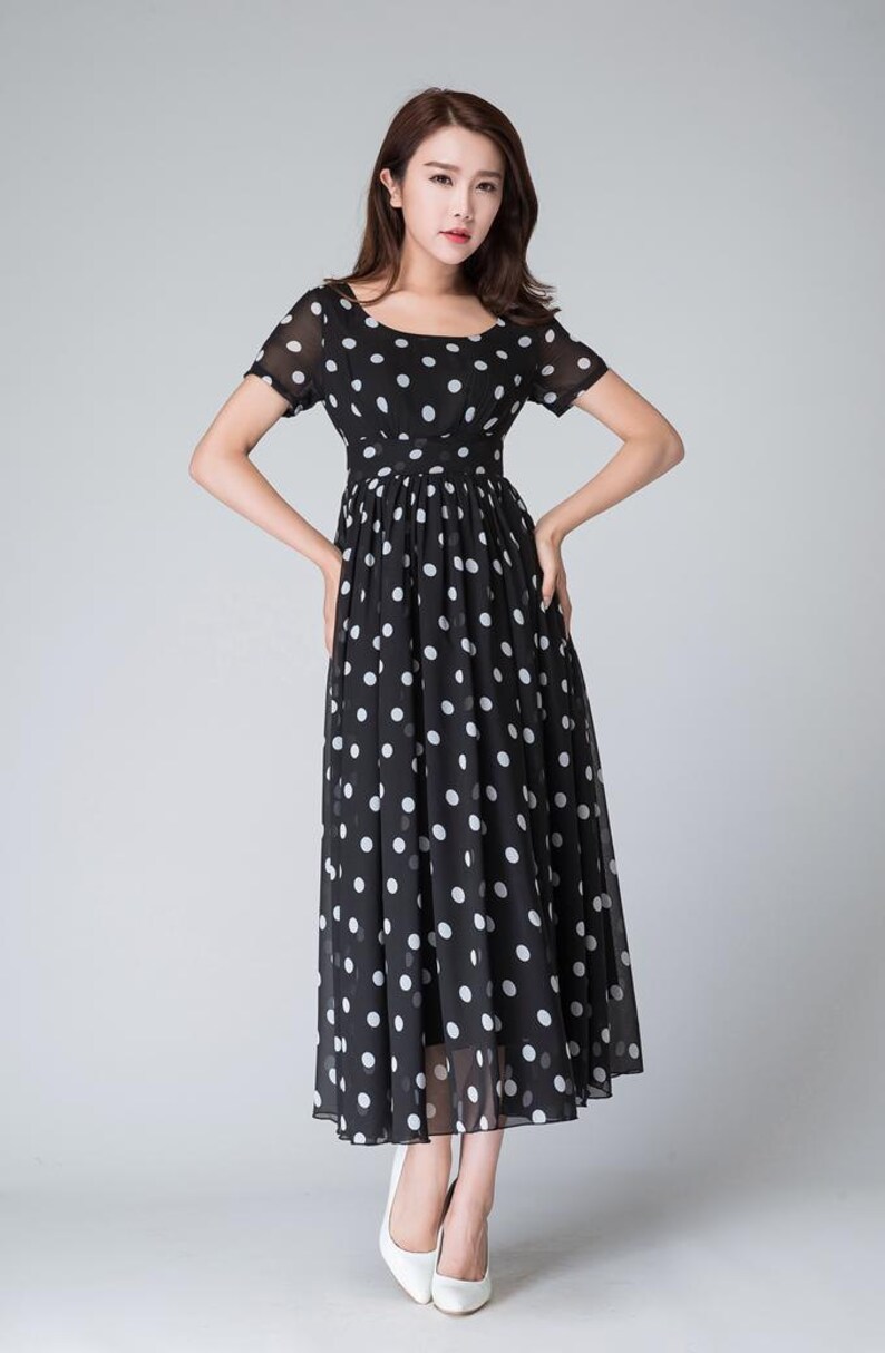 black and white polka dot dress with red shoes