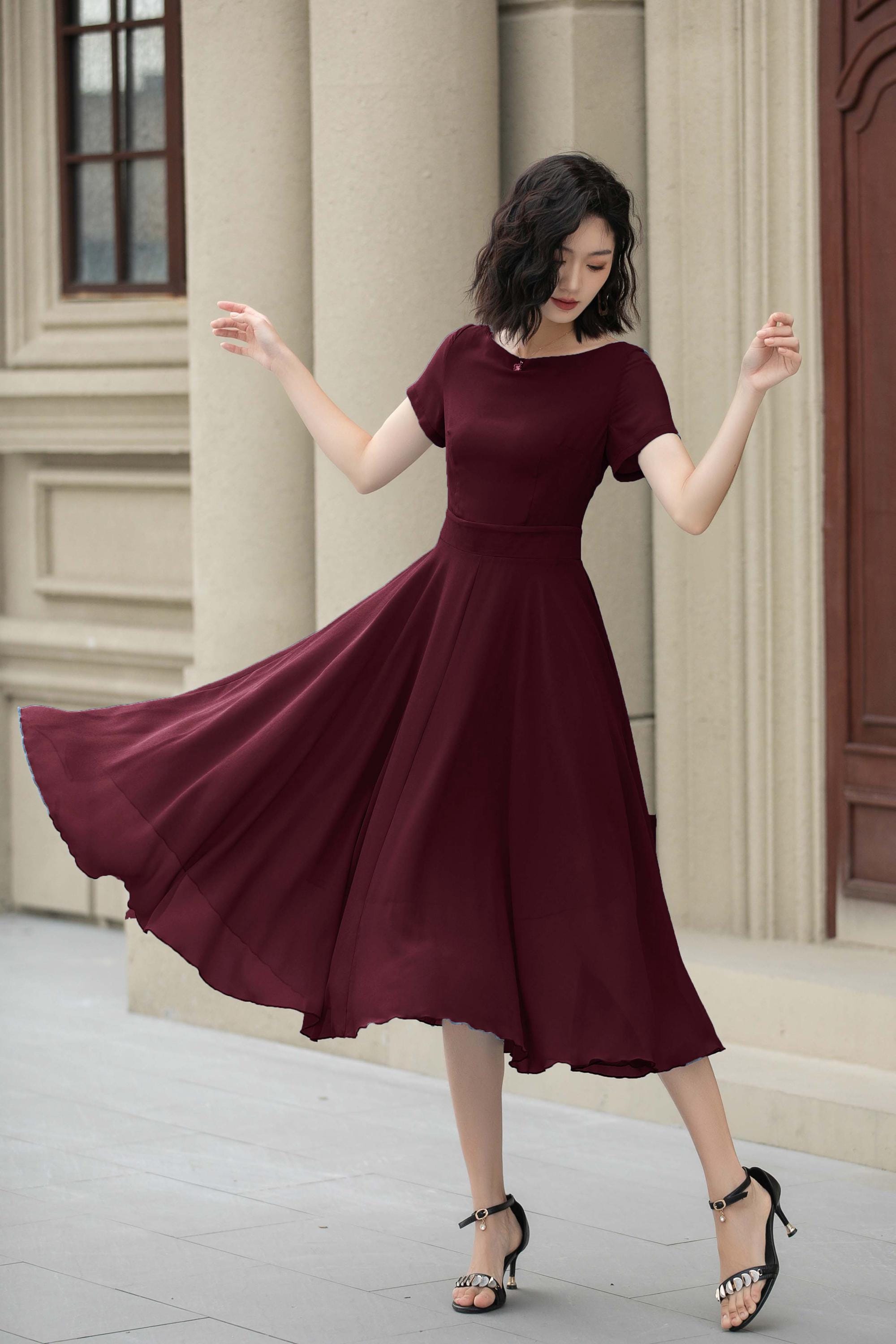 sleeveless tie back midi dress High Neck Tie-Back Midi Dress