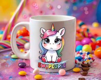 May include: White ceramic mug with a colorful cartoon unicorn illustration and the text "Ew, People".