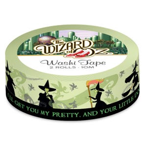 May include: Two rolls of green and black washi tape featuring silhouettes of the Wicked Witch of the West from The Wizard of Oz. The tape has the text "I'll get you my pretty, and your little dog too." and "The Wizard of Oz" with ruby slippers and the Emerald City in the background.