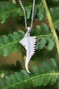 Trans fern 3D enamel Pride pendant necklace or pin badge brooch with glow-in-the-dark options