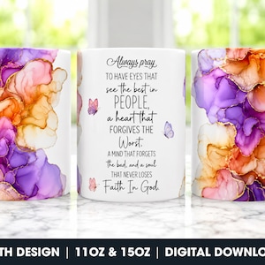 May include: A white ceramic mug featuring an abstract alcohol ink design in shades of purple, orange, and gold. The center displays the text: Always pray TO HAVE EYES THAT see the best in PEOPLE, a heart that FORGIVES THE Worst. A MIND THAT FORGETS the bad, and a soul THAT NEVER LOSES Faith In God, accented by small butterflies.