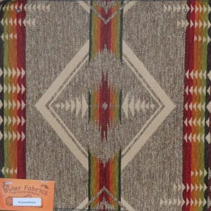 May include: A close-up of a woven fabric with a geometric pattern in shades of brown, beige, red, orange, and green. The fabric has a Southwestern or Native American inspired design. The text "Arizona Rainbow" is visible in the lower left corner of the image.