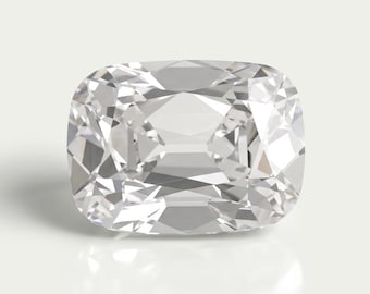 May include: A clear, colorless cushion-cut gemstone with a faceted surface that reflects light. The stone features a rectangular shape with rounded corners and a brilliant, multi-faceted arrangement that creates sharp geometric patterns.