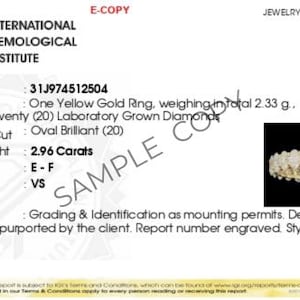 May include: A jewelry report for a yellow gold ring with twenty oval brilliant diamonds, weighing 2.96 carats. The report number is 31J974512504.
