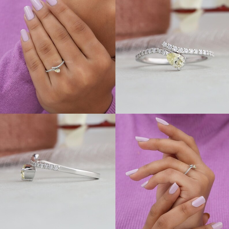 Peut inclure: Une bague ouverte de style bypass avec une pierre jaune en forme de poire &agrave; une extr&eacute;mit&eacute; et une pierre blanche ronde &agrave; l'autre, sur un anneau serti de petites pierres blanches pav&eacute;es. Le m&eacute;tal est argent&eacute; et le design est asym&eacute;trique.