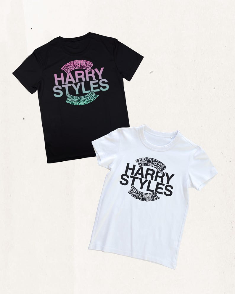 May include: A black t-shirt and a white t-shirt, each featuring a circular graphic with the text TOGETHER HARRY STYLES TOGETHER. The black shirt has a pink and light blue gradient print, while the white shirt has a solid black print.