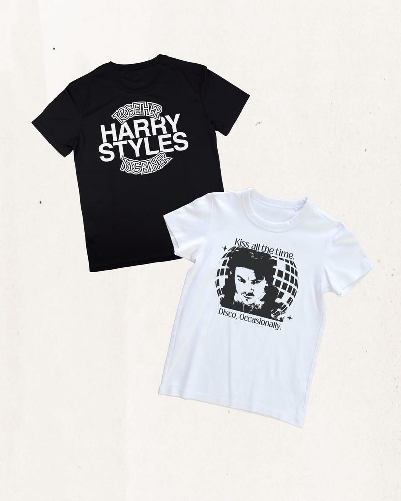 May include: A black t-shirt with white text reading "TOGETHER HARRY STYLES TOGETHER" and a white t-shirt featuring a black graphic of a person in front of a disco ball with the text "Kiss all the time. Disco, Occasionally." printed above and below.
