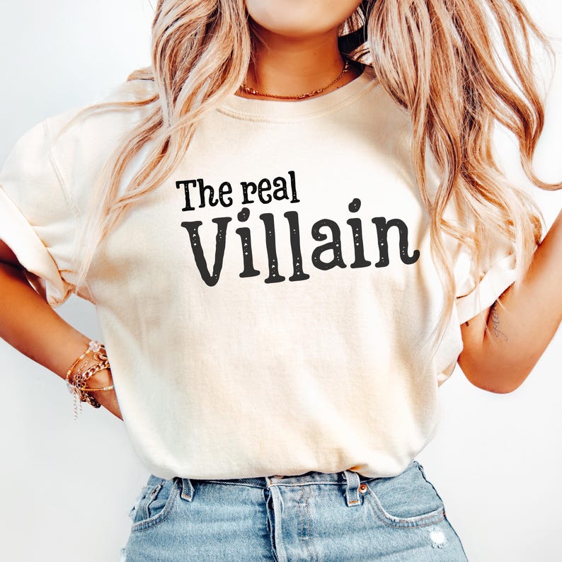 Embrace your inner mischief with our Comfort Colors T-shirt featuring The Villain printed boldly across the chest.