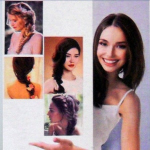 May include: A magazine page featuring various braided hairstyles. The image includes close-up shots of different braid styles, showcasing intricate designs and floral accents. A woman with long brown hair smiles on the right side of the page.