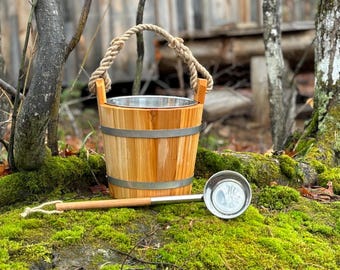 Cedar sauna bucket with stainless steel insert and matching ladle.