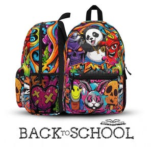 May include: A backpack featuring a vibrant graffiti-style print with a panda, a rabbit, skulls, and a smiley face. The design includes bright colors like orange, pink, blue, and yellow. The text BACK TO SCHOOL is printed below the backpack.