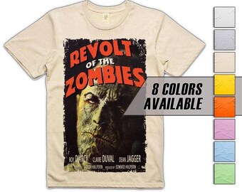 Puede incluir: Camiseta beige con un diseño de cartel de película vintage de "Revolt of the Zombies". El gráfico incluye el título de la película en rojo y la imagen de un zombi. También se muestra el texto "8 colores disponibles".