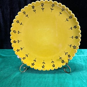 Handcrafted Italian Yellow Ceramic Plate with Scalloped Edges and Floral Motif 9”