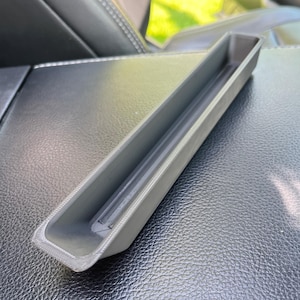 Inserção do console central do Ford F-150 (peça: FL3B-15047A74-D)