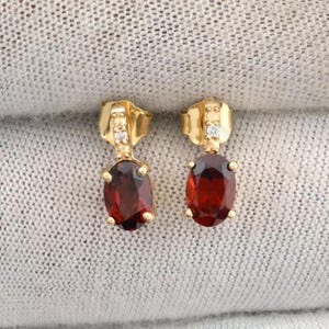 Garnet 6x4mm Oval Cut Gemstone Stud 14k Yellow Gold Moissanite Earrings For Women, Mozambique Red garnet Handmade Earring For Gifted Item