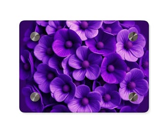 Peut inclure: Une image en gros plan d'un groupe de fleurs violettes. Les fleurs sont disposées en cercle et ont une texture douce et veloutée.
