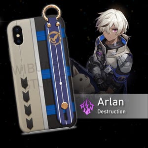 May include: A phone case with a blue and white strap and a gold ring. The case has a white and gold design with a black background. The text "Arlan Destruction" is visible in the image.