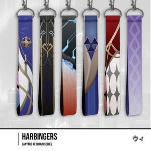 May include: Six fabric lanyard keychains with metal lobster clasps, each featuring distinct graphic patterns in blue, black, red, and purple color schemes. The text HARBINGERS LANYARD KEYCHAIN SERIES and Japanese characters are printed below.