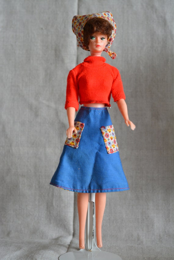 blue skirt and red top