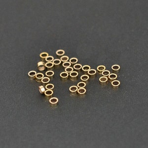Contas de crimpagem de 2 x 1 mm com preenchimento de ouro, fabricadas na China, GC90