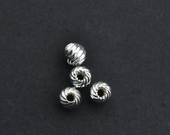 Ten .925 Sterling Silver 4mm Twisted Bead, A89