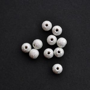 Diez cuentas de polvo de estrellas de 4 mm en plata de ley, A61