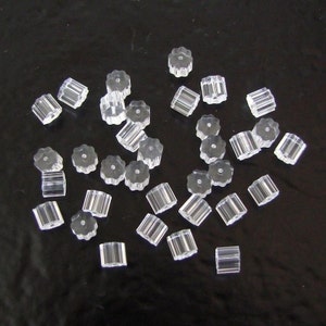 100pcs Clear Plastic Ear Nuts, GF53