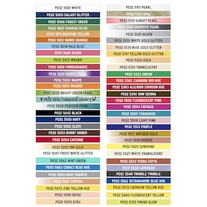 May include: A color chart with 40 different paint colors, each with a unique code and name. The colors range from white to black, with shades of green, blue, red, yellow, orange, and purple. The chart is divided into two columns, with the left column showing the lighter colors and the right column showing the darker colors.