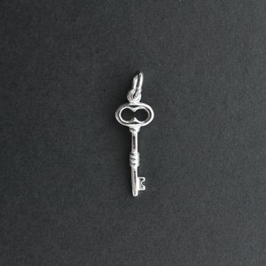 ONE Sterling Silver Key Charm 7.5x18mm, SC12