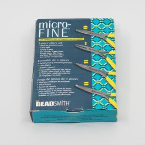 May include: A 4-piece pliers set in a box. The box is teal and white with the text "micro-FINE" and "the BEADSMITH". The set includes chain nose, round nose, flat nose, and bent flat nose pliers.