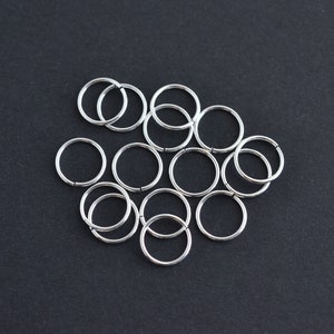 25 st - .925 sterlingsilver 8 mm öppna hoppringar 20.5ga, tillverkade i USA, A110