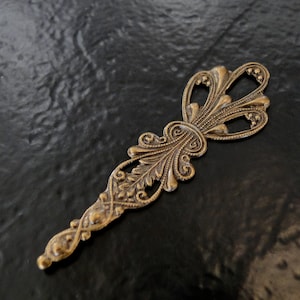 One Antiqued Gold Openwork Brass Stamping 56.5mm, Made in USA, AG24