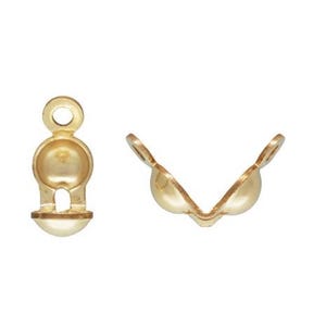 May include: Gold-tone metal clasp with a ball-shaped design. The clasp is open and ready to be attached to a necklace or bracelet.