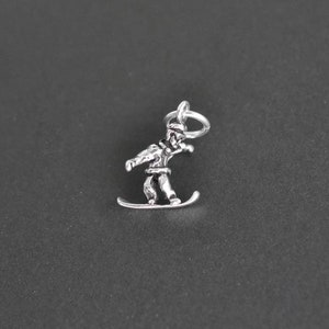 One Sterling Silver Snowboarder Charm, E85