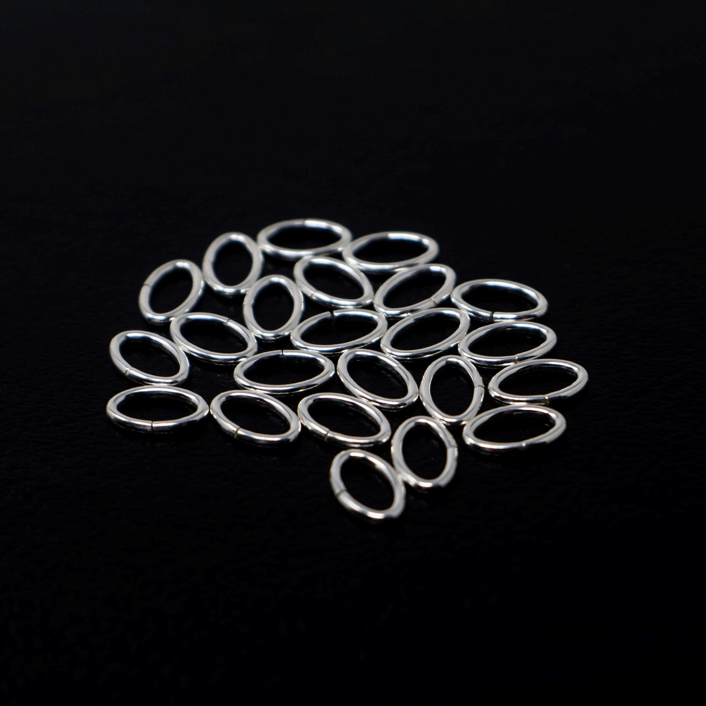 100pcs - .925 Sterling Silver 4x6mm Open Oval Jump Rings 20.5ga