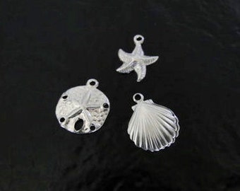 Set di ciondoli della vita marina: stella marina, conchiglia e dollaro di sabbia in argento sterling, prodotto negli Stati Uniti, SC5-7